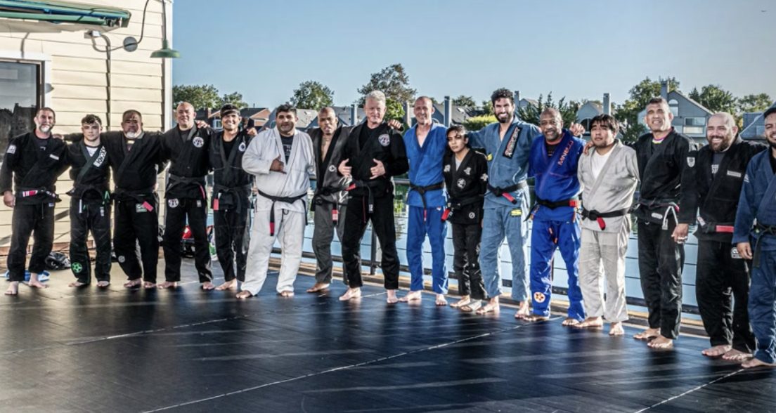 Black belts lined up at the Koffee Krew open mat